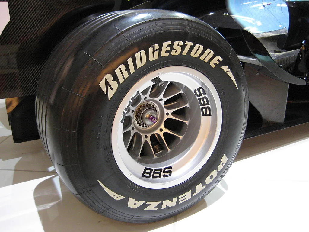 A Bridgestone branded tyre on a car.