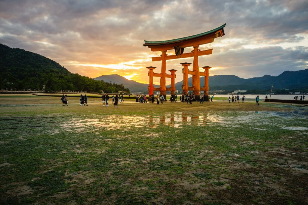 Orange gate surrounded by tourists