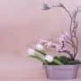 flowers in a pink bowl